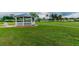 Quaint gazebo nestled in a green space at 402 Dorchester Pl # 28, Sun City Center, FL 33573