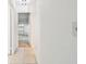 Bright hallway with tile flooring and access to other rooms at 402 Dorchester Pl # 28, Sun City Center, FL 33573