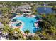 Community pool with hot tub and lounge area at 402 Dorchester Pl # 28, Sun City Center, FL 33573