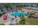 Resort-style pool with surrounding lounge area at 402 Dorchester Pl # 28, Sun City Center, FL 33573