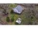 Aerial view showing house, gardens, and surrounding landscape at 4156 Mcintosh Rd, Dover, FL 33527