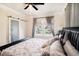 Main bedroom with King bed, hardwood floors, and sliding barn door at 4156 Mcintosh Rd, Dover, FL 33527