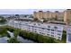 Aerial view of condo building showcasing waterside location and surrounding area at 4455 Duhme Rd # 303, St Petersburg, FL 33708