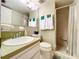 Updated bathroom with a shower and modern fixtures at 4455 Duhme Rd # 303, St Petersburg, FL 33708
