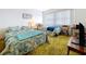 Guest bedroom with two twin beds and window at 4455 Duhme Rd # 303, St Petersburg, FL 33708