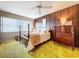 Bedroom with wooden four-poster bed and built-in dresser at 4455 Duhme Rd # 303, St Petersburg, FL 33708