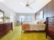 Bedroom with double bed, dresser, and a ceiling fan at 4455 Duhme Rd # 303, St Petersburg, FL 33708