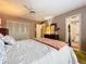 Main bedroom with a walk-in closet and en-suite bathroom access at 4455 Duhme Rd # 303, St Petersburg, FL 33708