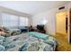 Bright bedroom with two twin beds and ample natural light at 4455 Duhme Rd # 303, St Petersburg, FL 33708