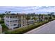 Two-story building with palm trees at 4455 Duhme Rd # 303, St Petersburg, FL 33708