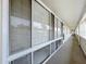 Exterior hallway with access to condo units at 4455 Duhme Rd # 303, St Petersburg, FL 33708