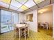 Bright kitchen features a built-in microwave and updated countertops at 4455 Duhme Rd # 303, St Petersburg, FL 33708