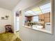 Kitchen features wood cabinets and a window at 4455 Duhme Rd # 303, St Petersburg, FL 33708