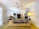Cozy living room featuring a sofa, TV, and ample natural light at 4455 Duhme Rd # 303, St Petersburg, FL 33708