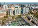 Aerial view of a modern high-rise residential building complex with amenities at 450 Knights Run Ave # 705, Tampa, FL 33602