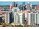 Modern highrise building with city skyline in background at 450 Knights Run Ave # 705, Tampa, FL 33602