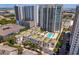 Aerial perspective of a modern residential complex featuring a pool and courtyard at 450 Knights Run Ave # 705, Tampa, FL 33602