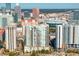Luxury highrise condo building with city skyline in background at 450 Knights Run Ave # 705, Tampa, FL 33602