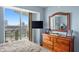 Spacious bedroom with hardwood floors and city views at 450 Knights Run Ave # 705, Tampa, FL 33602