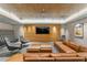 Community lounge with comfortable seating and large TV at 450 Knights Run Ave # 705, Tampa, FL 33602