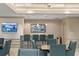 Community bar with seating and a large mirror at 450 Knights Run Ave # 705, Tampa, FL 33602