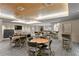 Community game room with tables, chairs, and a pool table at 450 Knights Run Ave # 705, Tampa, FL 33602