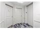 Condo hallway with elevator and apartment access at 450 Knights Run Ave # 705, Tampa, FL 33602