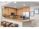 Open kitchen with granite countertops and breakfast bar at 450 Knights Run Ave # 705, Tampa, FL 33602