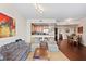 Bright and spacious living room with hardwood floors and open floor plan at 450 Knights Run Ave # 705, Tampa, FL 33602