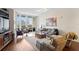 Spacious living room with hardwood floors and city views at 450 Knights Run Ave # 705, Tampa, FL 33602