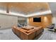 Community lounge with large sectional sofa and TV at 450 Knights Run Ave # 705, Tampa, FL 33602