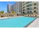 Resort-style pool with lounge chairs and a large sundeck at 450 Knights Run Ave # 705, Tampa, FL 33602