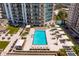 Resort-style pool with spacious sundeck and lounge area at 450 Knights Run Ave # 705, Tampa, FL 33602
