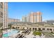 Relaxing pool and patio area with city views at 450 Knights Run Ave # 705, Tampa, FL 33602