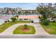 Aerial view of waterfront home with circular driveway and canal access at 4500 38Th S St, St Petersburg, FL 33711