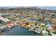 Aerial view of waterfront home with private dock and boat, situated in a neighborhood with canals at 4500 38Th S St, St Petersburg, FL 33711