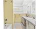 Clean bathroom with double vanity and shower/tub combo at 4500 38Th S St, St Petersburg, FL 33711