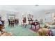 Dining room with a large table and chairs, and access to a back patio at 4500 38Th S St, St Petersburg, FL 33711