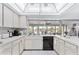 L-shaped kitchen features ample counter space and water views at 4500 38Th S St, St Petersburg, FL 33711
