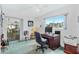 Home office with built-in desk and access to lanai at 4500 38Th S St, St Petersburg, FL 33711