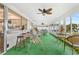 Spacious screened-in porch with canal views and seating at 4500 38Th S St, St Petersburg, FL 33711