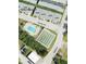 Aerial view showing pool and shuffleboard at 4939 Docner St, New Port Richey, FL 34652