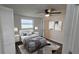 Bright bedroom with a double bed, window, and built-in closet at 4939 Docner St, New Port Richey, FL 34652