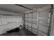 Garage interior with overhead door at 4939 Docner St, New Port Richey, FL 34652