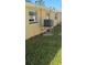 Rear exterior view showing AC unit at 4939 Docner St, New Port Richey, FL 34652