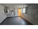 Laundry area with water heater and shelving at 4939 Docner St, New Port Richey, FL 34652