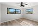 Spacious bedroom with large windows and light flooring at 5215 Dover Ne St, St Petersburg, FL 33703
