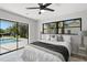 Bedroom with water view and sliding glass doors at 5215 Dover Ne St, St Petersburg, FL 33703