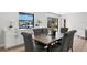 Elegant dining area with water views and built-in cabinetry at 5215 Dover Ne St, St Petersburg, FL 33703