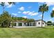 Side view of the house showing the pool and backyard at 5215 Dover Ne St, St Petersburg, FL 33703